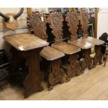 Four oak and walnut Sgabello hall chairs and a similar table, 19th century W.61cm