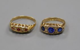 An early 20th century 18ct gold, ruby and diamond five stone ring and one other similar 18ct gold