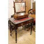 A Victorian style writing table and a toilet mirror W.76cm and W.49cm