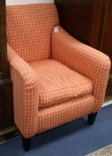 A pair of upholstered armchairs