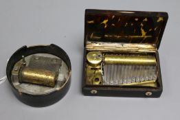 A 19th century tortoiseshell pocket musical box and a 'Carisbrooke Castle' musical box, the first of