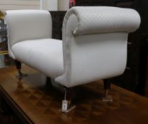 An upholstered window seat W.136cm