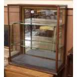 A glass display cabinet W.62cm