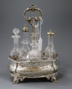 A Victorian embossed silver cruet stand, Roberts & Hall, Sheffield, 1853, with six later