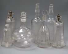 A quantity of glass decanters tallest 31cm