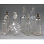 A quantity of glass decanters tallest 31cm