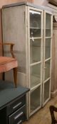 A large painted two door cabinet W.100cm