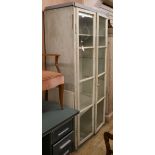 A large painted two door cabinet W.100cm