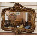 A giltwood and composite wall mirror W.88cm