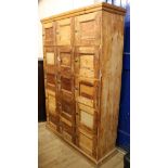 A 19th century pine cabinet locker W.125cm