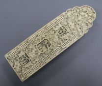 A 19th century Chinese finely carved ivory cribbage board