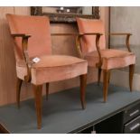 A pair of French Art Deco beech elbow chairs