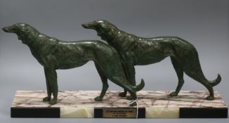 A bronzed metal Art Deco model of Borzoi dogs length 56cm