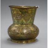 A Cairo ware brass vase, in the form of a mosque lamp, having wide tapered neck with pierced