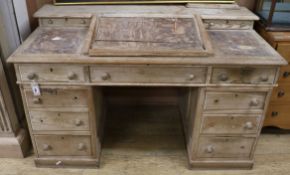 A pine pedestal desk W.138cm