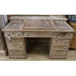 A pine pedestal desk W.138cm