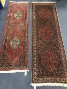 Two Persian runners 195 x 61cm and 220 x 74cm