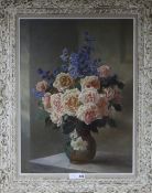 ER 1887, oil on canvas, pink roses and delphiniums in a vase, initialled and dated, 67 x 49cm