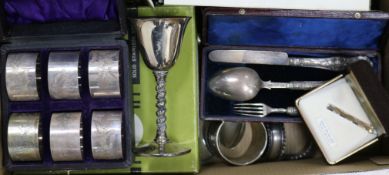 Assorted silver including napkin rings and cased Victorian christening trio and a small group of