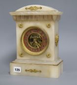 A 19th century alabaster French mantel clock with skeletonised centre height 29cm