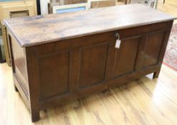 A four panel oak and elm linen chest W.148cm