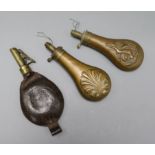 Two 19th century copper shot flasks and another in leather