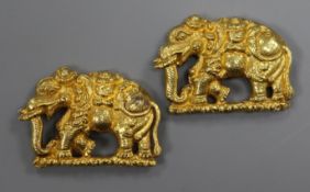 A pair of Indian? yellow metal "elephant" appliques, 33mm.