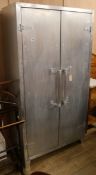 A two door aluminium wardrobe W.95cm