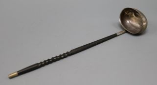 A modern Irish silver punch ladle, with baleen? handle, William Egan & Sons, Dublin, 1980, 31cm.