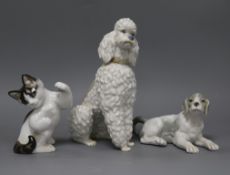 Two Lladro models of dogs and a Rosenthal cat tallest 22cm