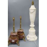An alabaster lamp and two others tallest 62cm