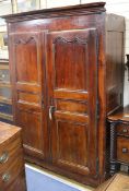 An 19th century French fruitwood armoire W.150cm