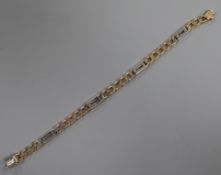 An Italian two colour 375 yellow metal curb link bracelet, 19cm.