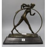 A bronze figure of a hoop girl, on marble base height approx. 41cm
