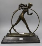 A bronze figure of a hoop girl, on marble base height approx. 41cm