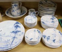 A quantity of tableware by Isis Ceramics, Oxford in 'The Landscape' pattern, comprising 12 dinner