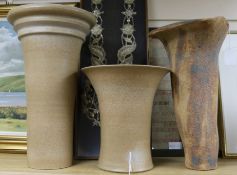 Two similar stoneware rhubarb forcers by Usch Spettigue and a tall planter by Irene Bell of