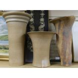 Two similar stoneware rhubarb forcers by Usch Spettigue and a tall planter by Irene Bell of