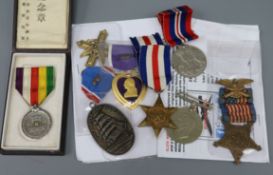 A group of medals comprising a U.S Distinguished Service Cross a Grand Army of the Republic Veterans