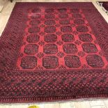 A Bokhara red ground carpet 340 x 256cm