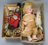 An Armand Marseille bisque headed doll, a peddler doll and sundry dolls house miniatures