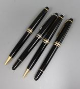 Two Mont Blanc fountain pens and two ball point Mont Blanc pens