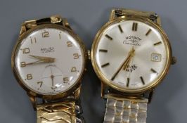 A gentleman's 9ct gold Majex wrist watch and a yellow metal Rotary Commodore GT wrist watch.