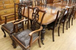A Victorian mahogany extending dining table and eight Chippendale revival chairs 237cm fully