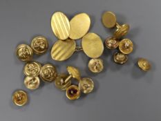 A pair of 18ct gold oval engine-turned cufflinks and a collection of gilt naval buttons, dress studs