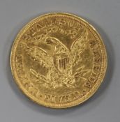An 1895 US Liberty five dollar gold coin.