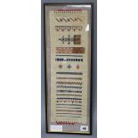 A 19th century Scandinavian sampler, framed, overall length 53.5cm