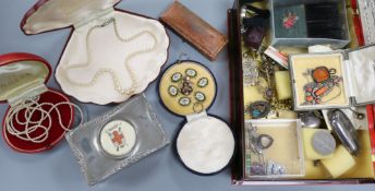 A group of costume jewellery and vertu including a silver sovereign case.