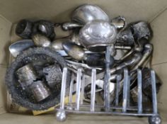 A silver toast rack, ten Hanau white metal tot holders and a similar cream jug and assorted mixed