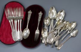A group of assorted mainly Victorian silver flatware, including a christening pair, 24 oz.